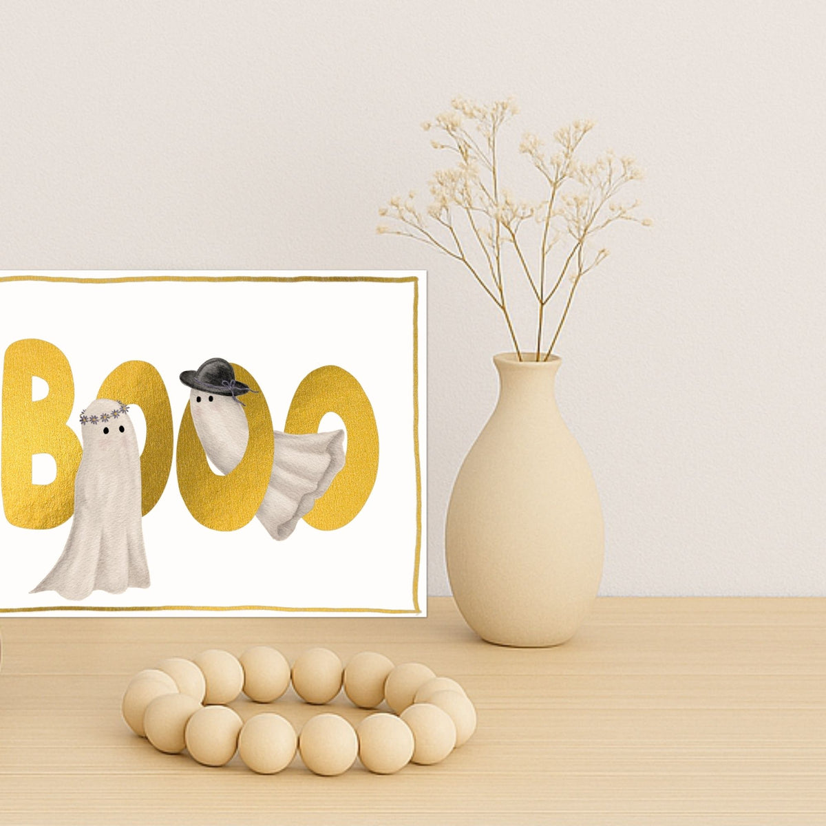 Halloween Karte mit zwei kleinen Gespenstern und Aufschrift booo